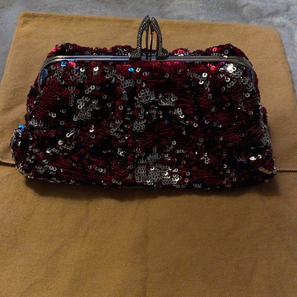 Christian Louboutin Handbags - Christian Louboutin 100% Authentic clutch excellent condition red and silver seq